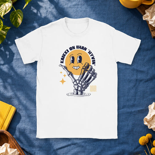 T-shirt featuring a skeleton hand holding a yellow smiley face beside the Finnish words Kaikki on ihan hyvin.