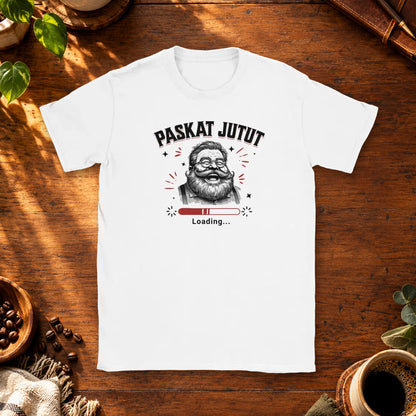 T-paita, jonka printissä virnistävä hahmo ja latauspalkki Paskat jutut -printissä.