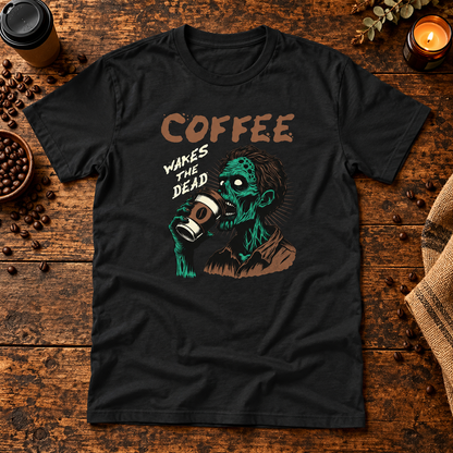 Themed flat-lay photograph of Coffee Wakes The Dead - T-paita with accessories related to its printed design.