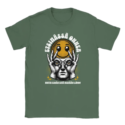Green T-shirt featuring a worried character holding a smiley face beside the Finnish words Etsim�ss� onnea.