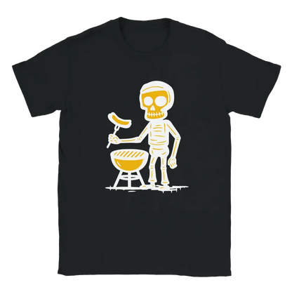 Black T-shirt featuring a skeleton beside a round barbecue holding a sausage on a grilling fork.