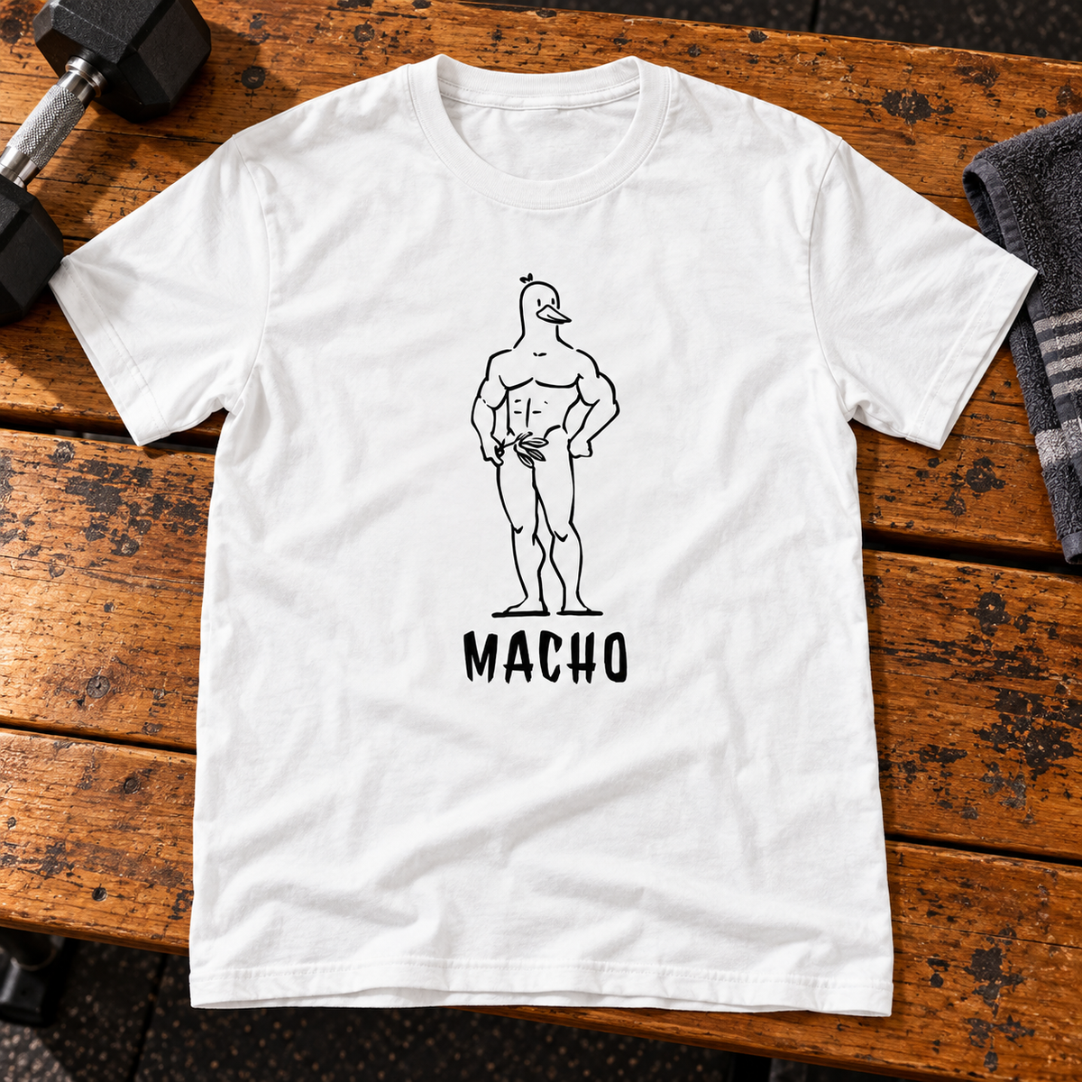 Themed flat-lay photograph of Macho Duck - T-paita with accessories related to its printed design.