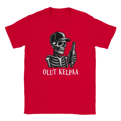 Red T-shirt featuring a skull wearing a cap and holding a bottle beside the Finnish words Olut kelpaa.