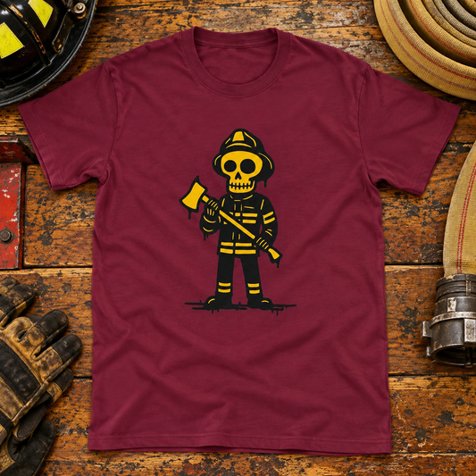 Maroon Palomies skeleton firefighter T-shirt on an equipment bench with a helmet, hose and work gloves.
