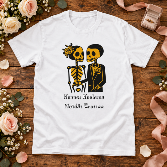 White Till Death Do Us Part skeleton bride and groom T-shirt on a wedding-themed wooden table with roses, rings and satin ribbons.