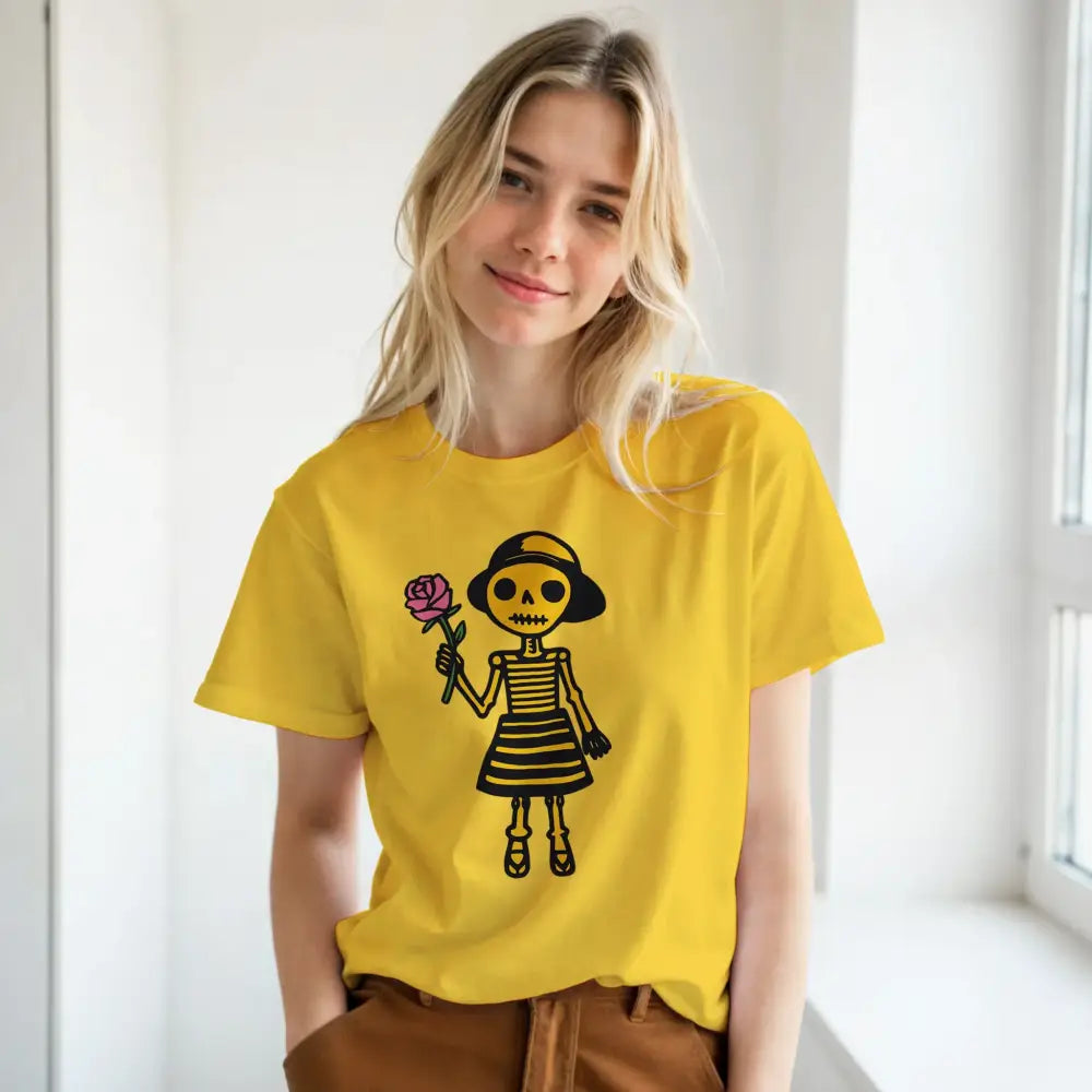 Yellow women's T-shirt featuring a skeleton girl in a striped dress holding a rose.
