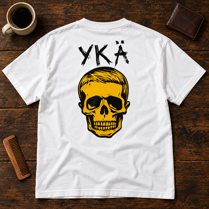 Themed flat-lay photograph of YKÄ - T-paita (kuva selässä) with accessories related to its printed design.